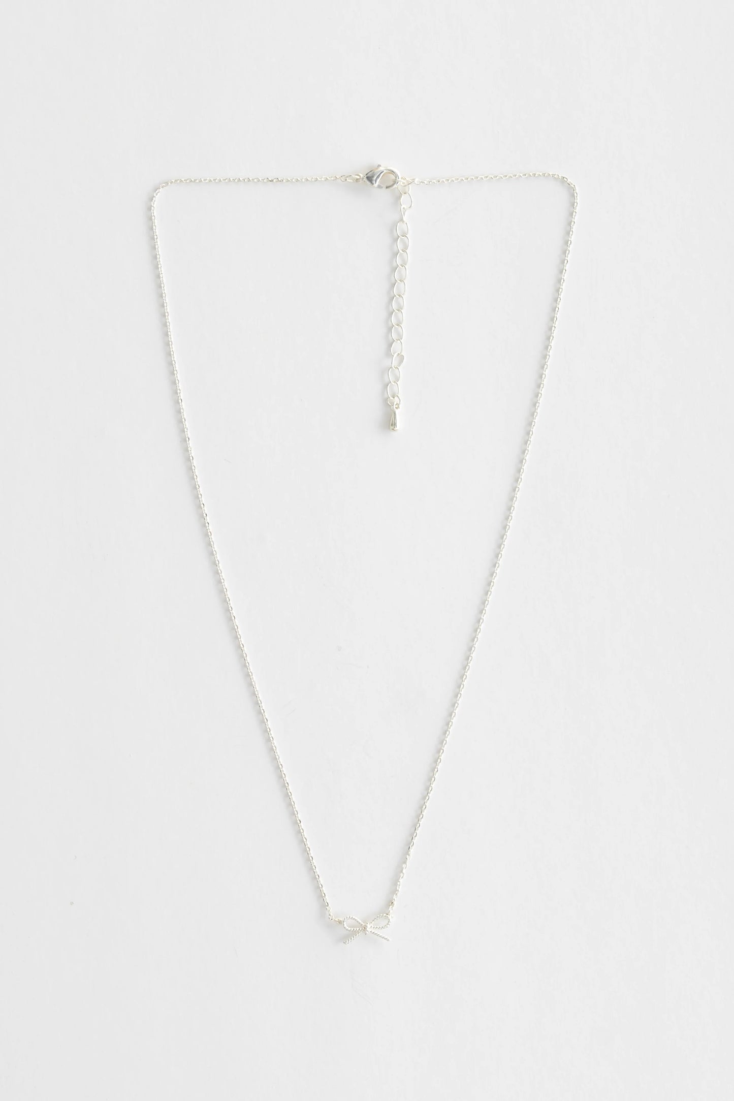 STELLA + GEMMA NECKLACE - SILVER ROPE BOW - THE VOGUE STORE