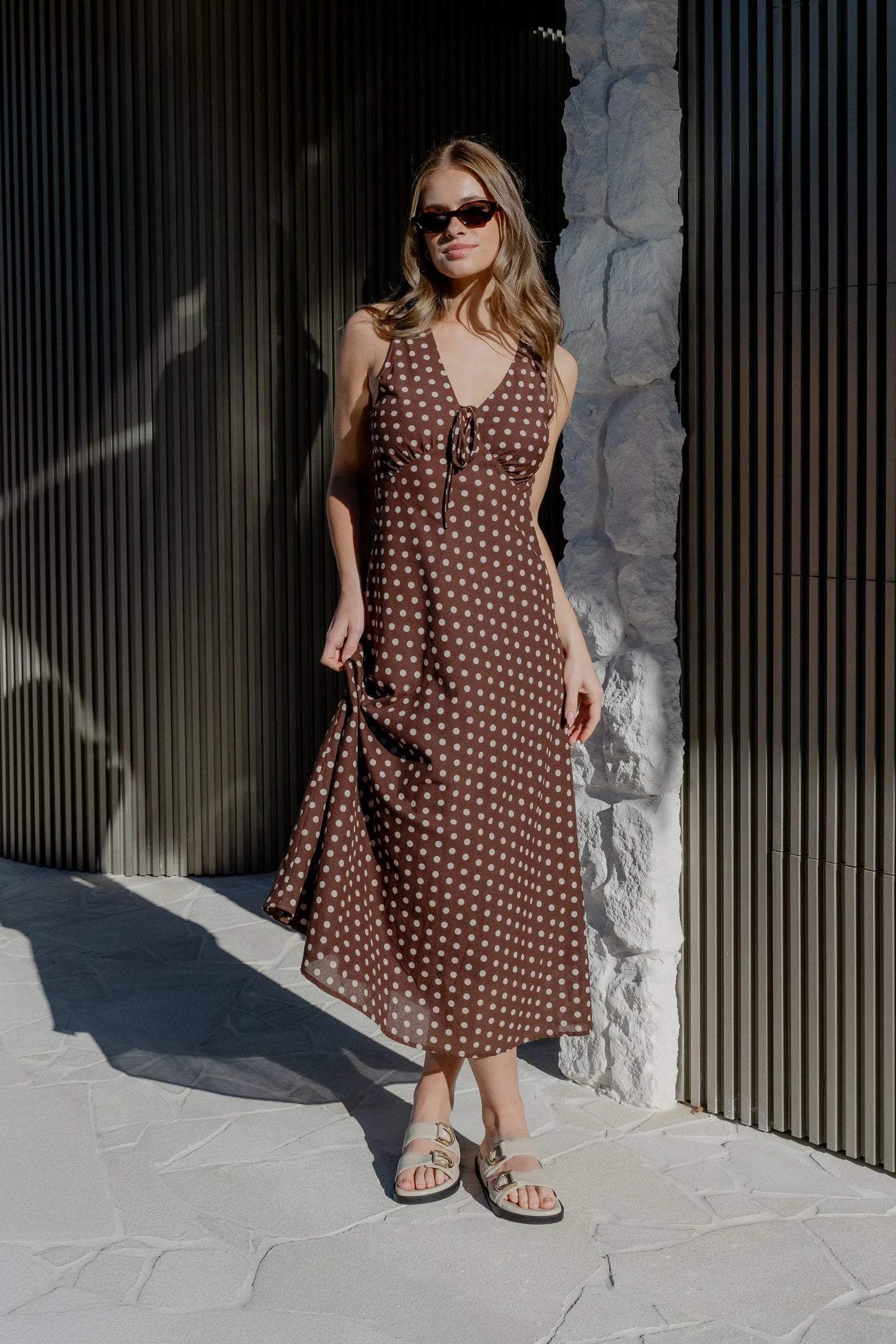 AMONG THE BRAVE INFINITY CHOCOLATE POLKA DOT SLEEVELESS BIAS MIDI DRESS - THE VOGUE STORE