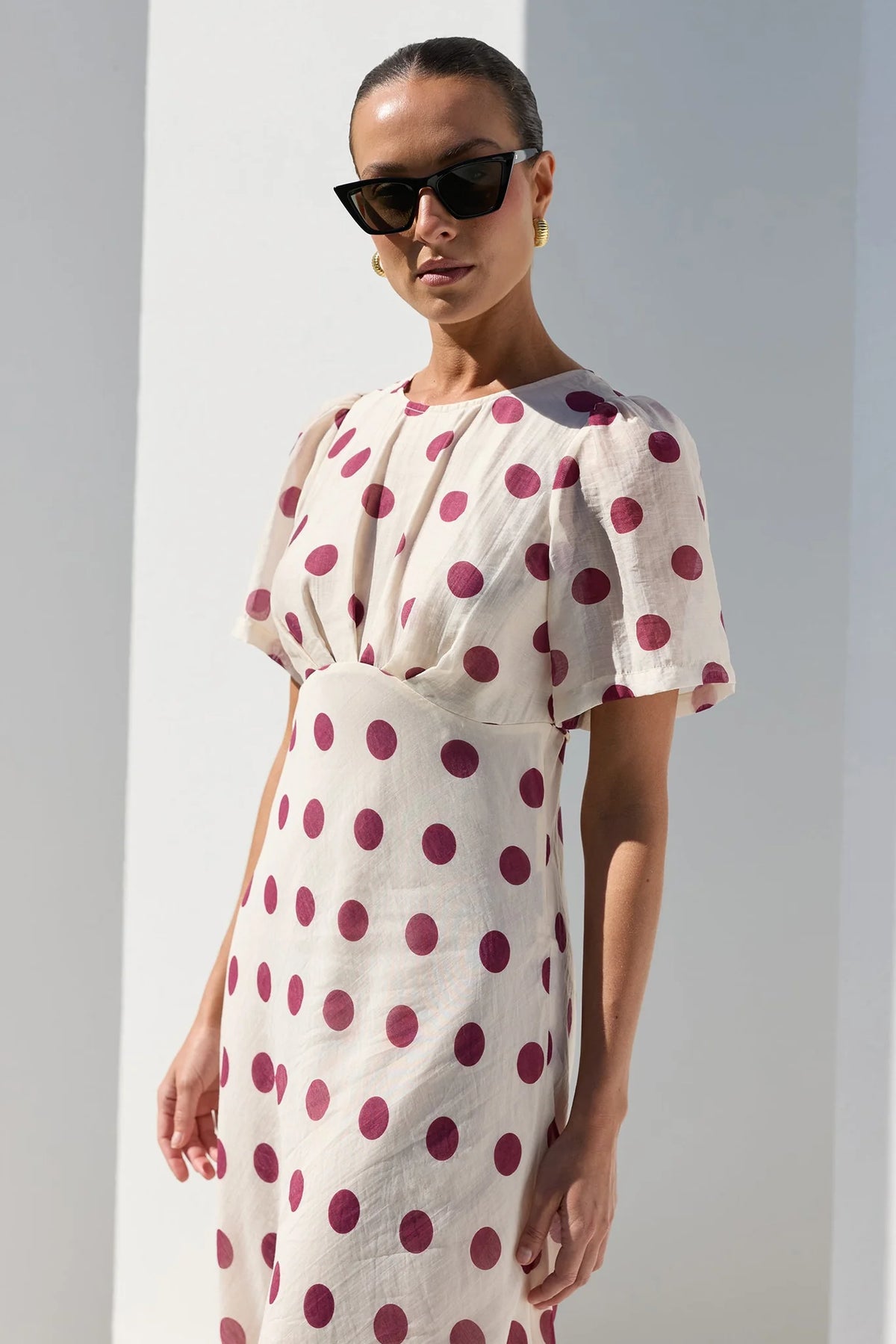 STORIES BE TOLD CENTRESTAGE CREAM WINE POLKA DOT TWIST FRONT SS MAXI DRESS - THE VOGUE STORE