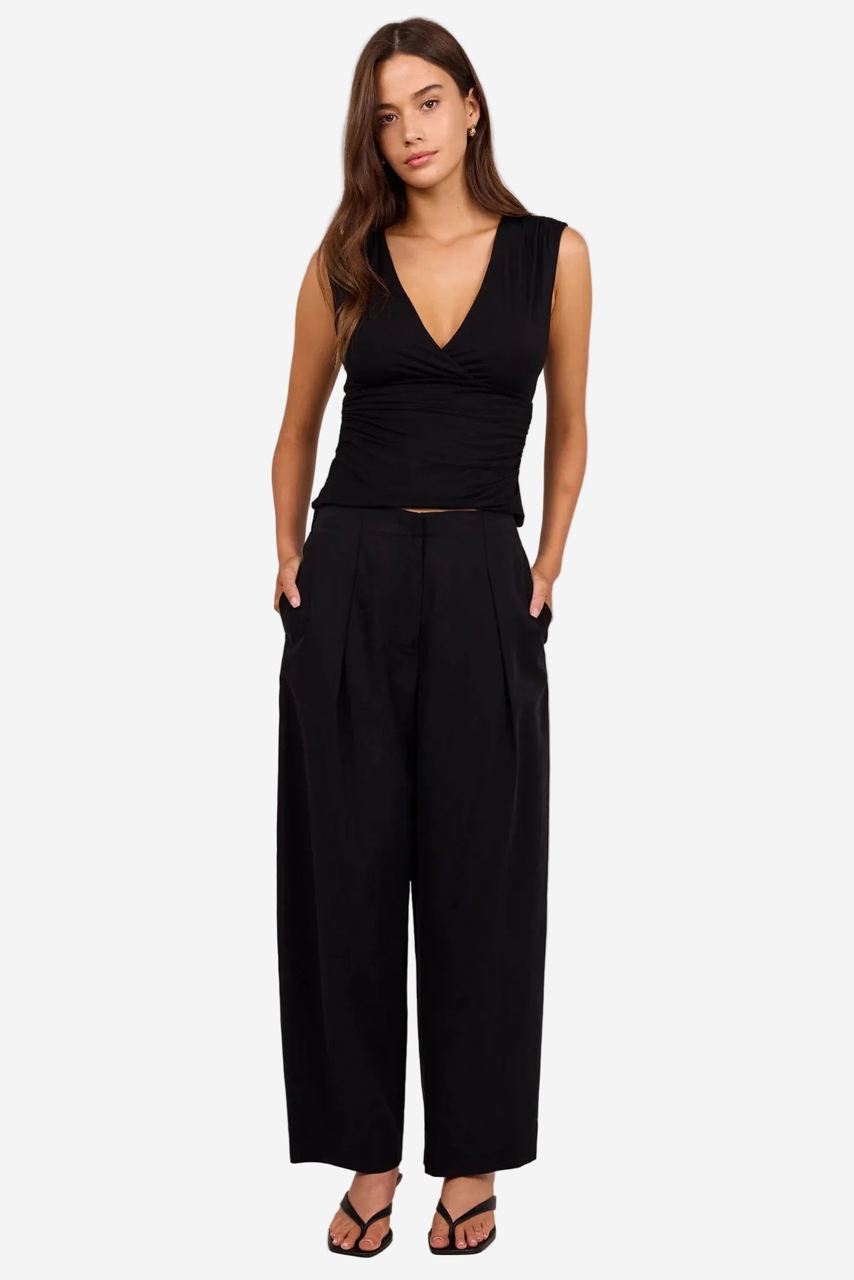 STORIES BE TOLD MANIFESTO BLACK FRONT PLEAT BARREL LEG PANTS - THE VOGUE STORE