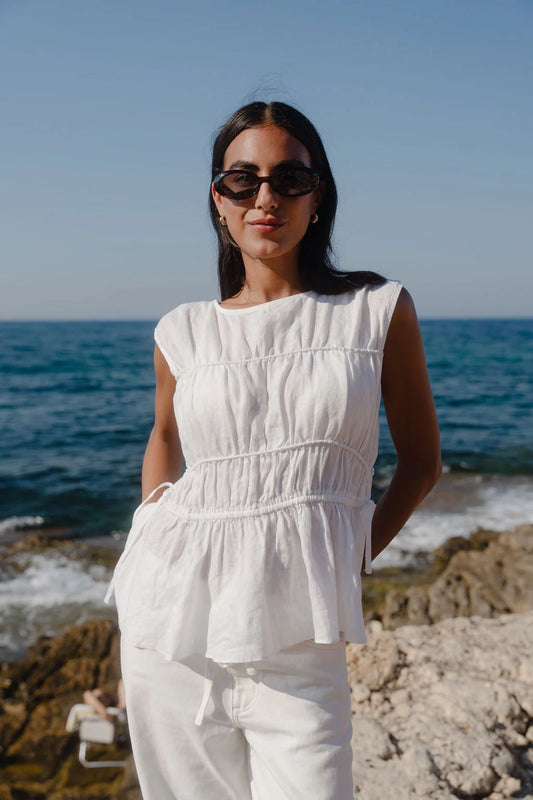 STORIES BE TOLD CONTEXT IVORY LINEN RELAXED SLEEVELESS TOP - THE VOGUE STORE