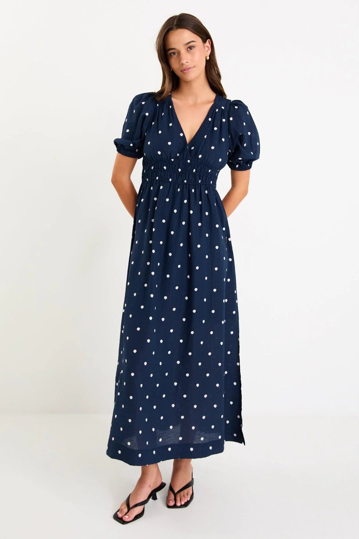 STORIES BE TOLD ELOQUENT NAVY POLKA DOT FLUTTER SLEEVE MAXI DRESS - THE VOGUE STORE