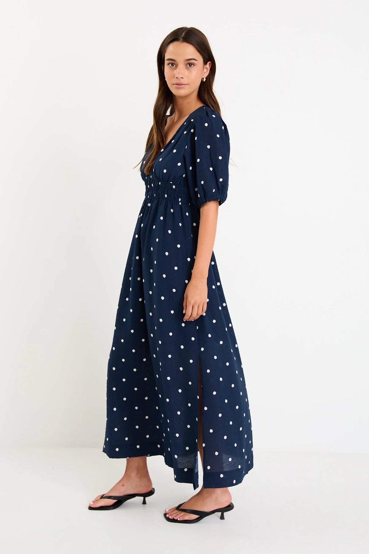 STORIES BE TOLD ELOQUENT NAVY POLKA DOT FLUTTER SLEEVE MAXI DRESS - THE VOGUE STORE