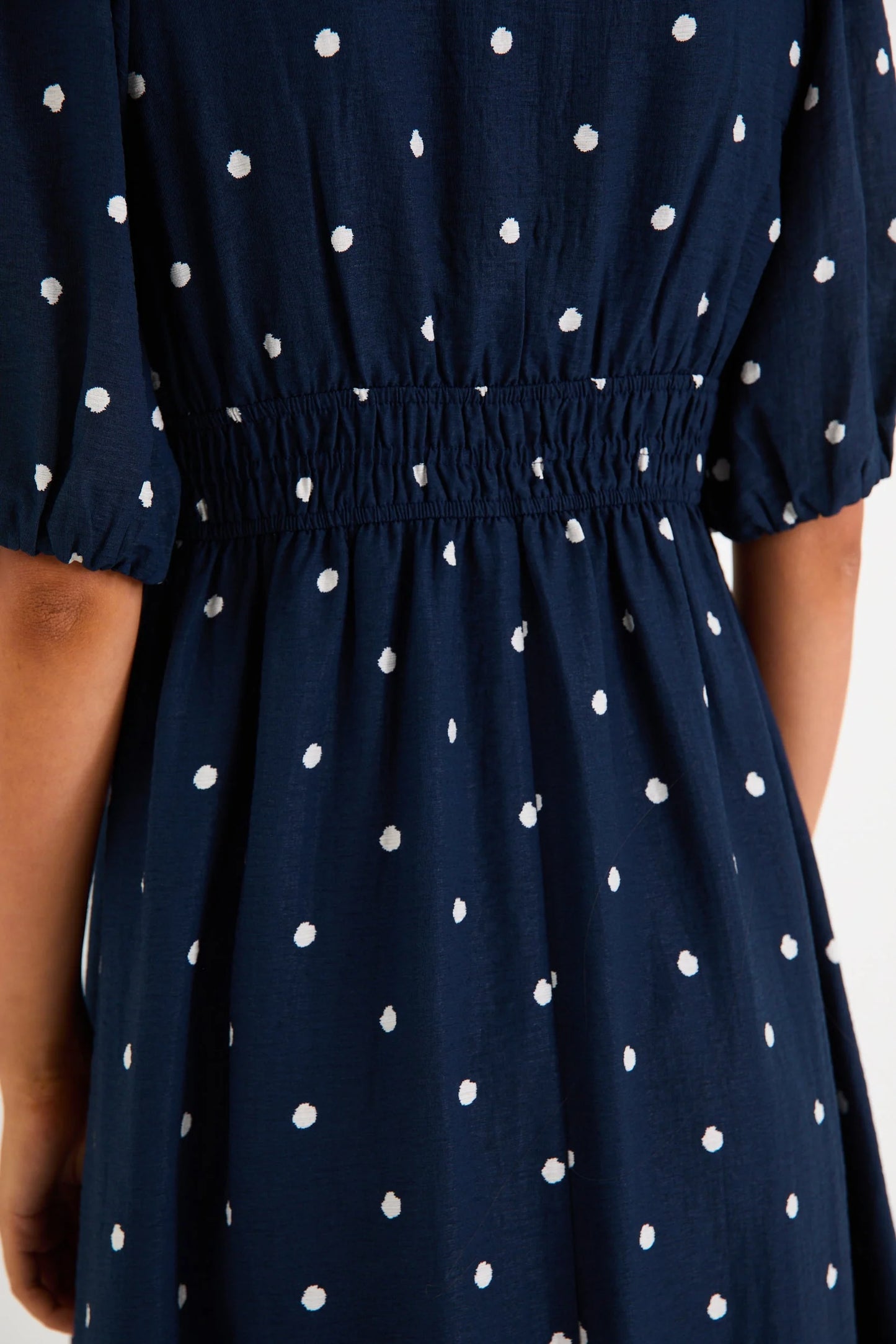 STORIES BE TOLD ELOQUENT NAVY POLKA DOT FLUTTER SLEEVE MAXI DRESS - THE VOGUE STORE