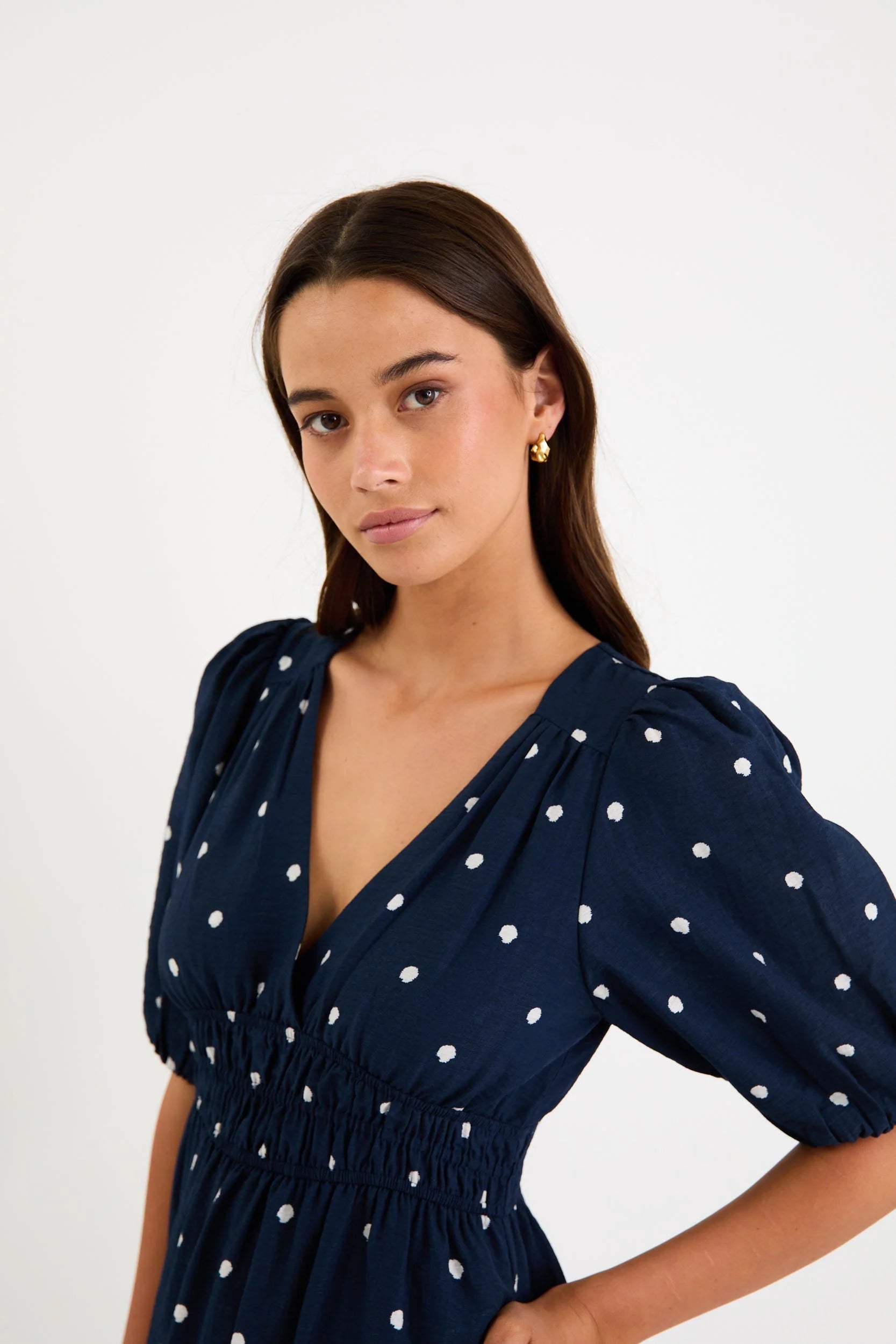 STORIES BE TOLD ELOQUENT NAVY POLKA DOT FLUTTER SLEEVE MAXI DRESS - THE VOGUE STORE