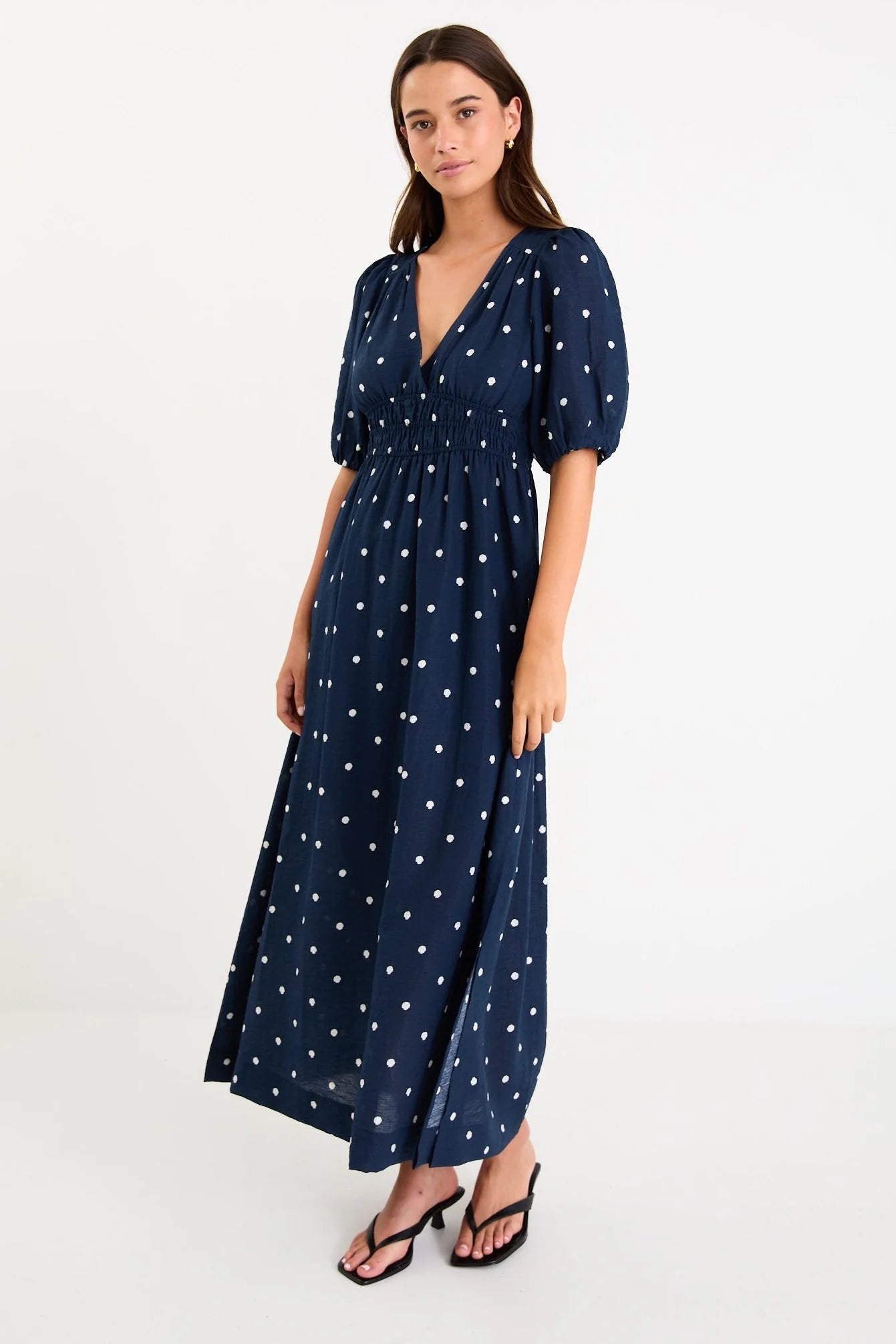 STORIES BE TOLD ELOQUENT NAVY POLKA DOT FLUTTER SLEEVE MAXI DRESS - THE VOGUE STORE