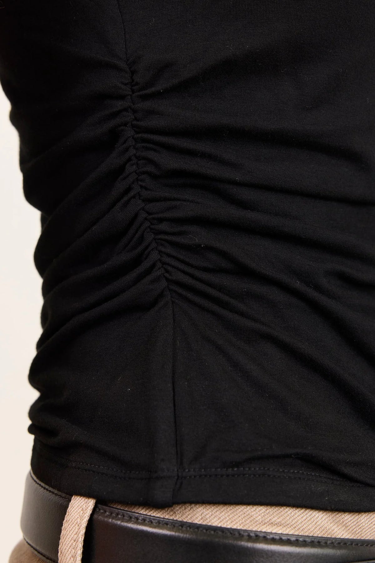 STORIES BE TOLD BLACK FLITTER GATHERED WAIST DETAIL SHORT SLEEVE TOP - THE VOGUE STORE