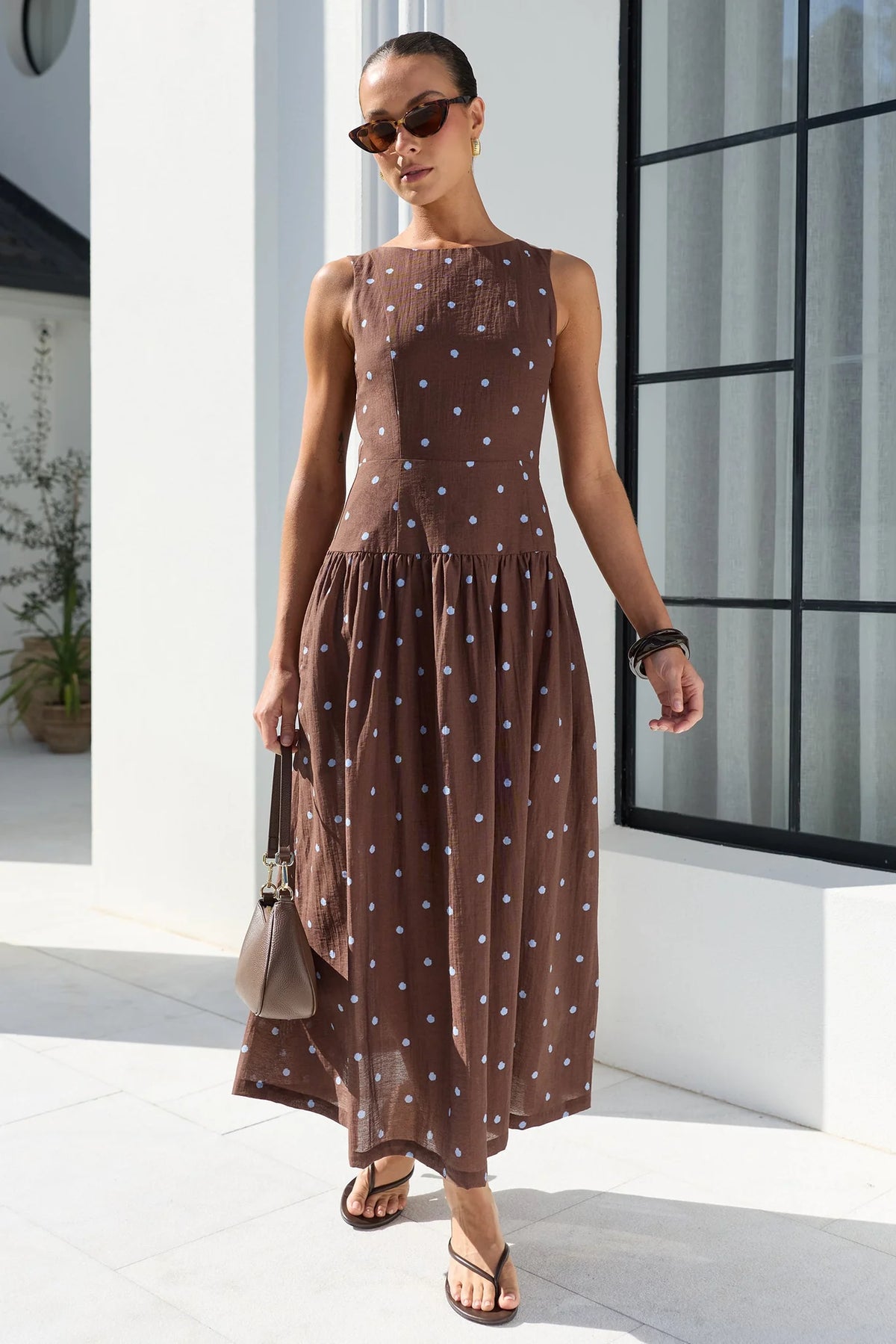 STORIES BE TOLD RESULTS MOCHA BLUE POLKA DOT SHIRRED BACK SLEEVELESS MAXI DRESS - THE VOGUE STORE