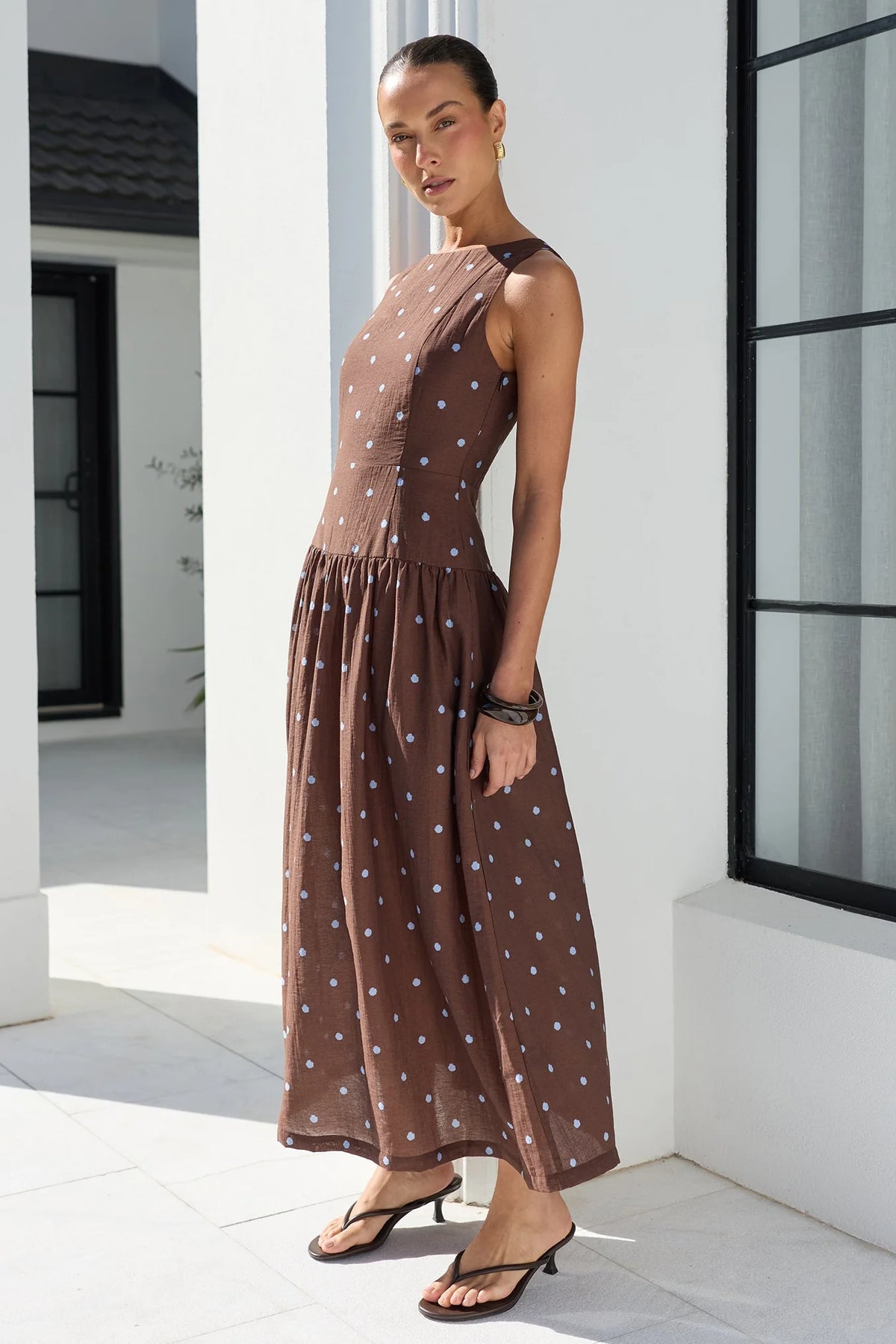 STORIES BE TOLD RESULTS MOCHA BLUE POLKA DOT SHIRRED BACK SLEEVELESS MAXI DRESS - THE VOGUE STORE