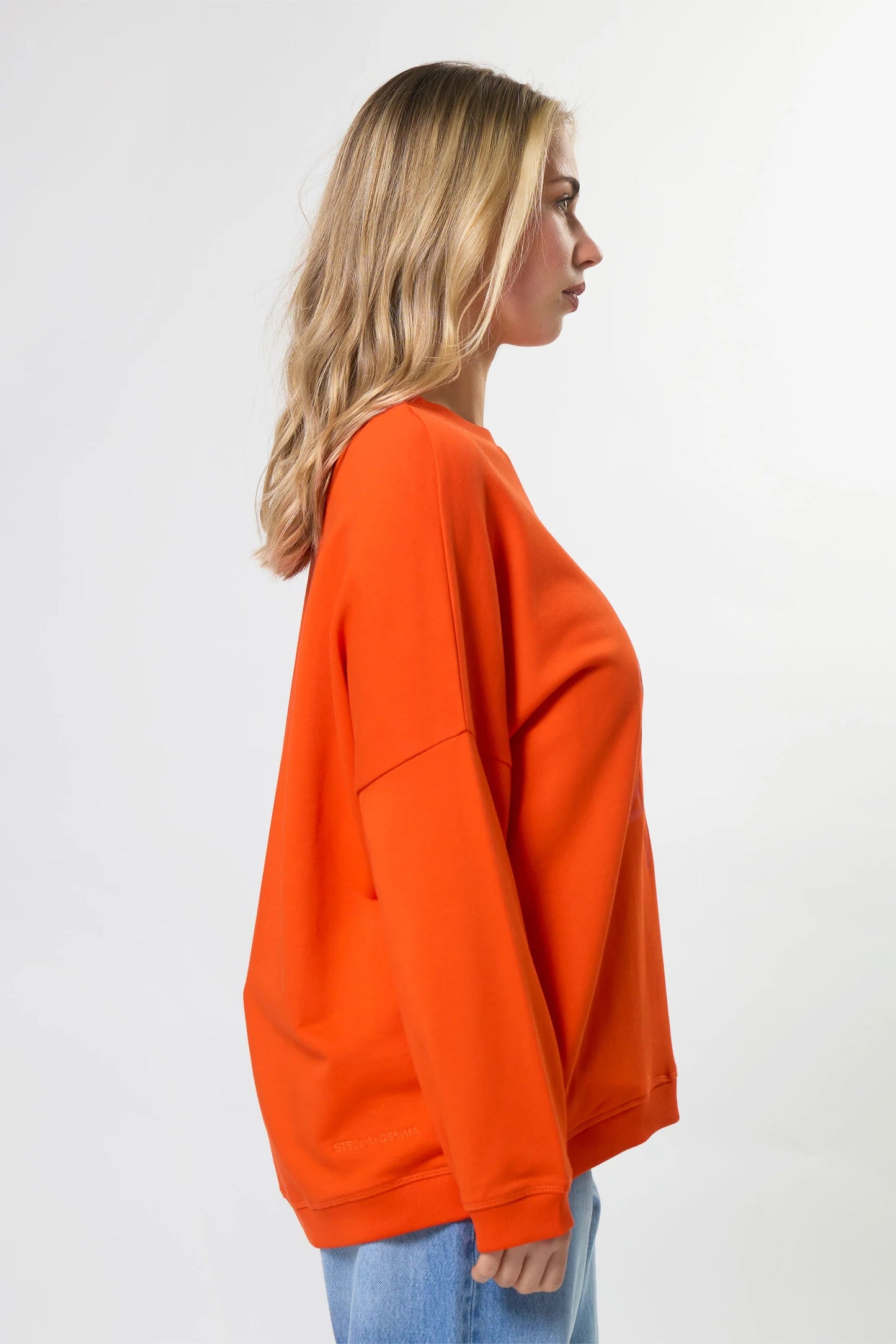 STELLA + GEMMA NEWPORT POCKET ROTATION SWEAT - TANGERINE - THE VOGUE STORE