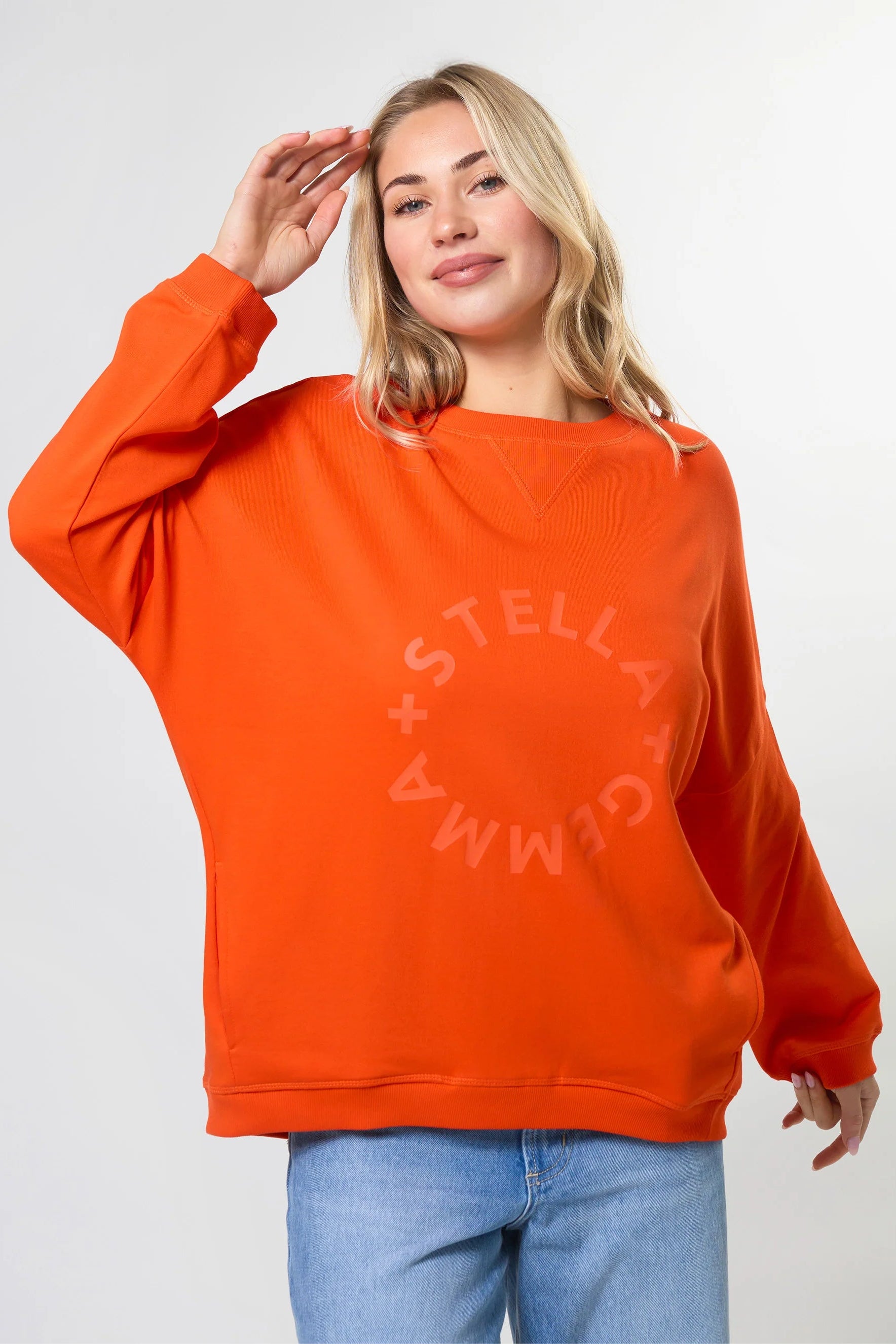 STELLA + GEMMA NEWPORT POCKET ROTATION SWEAT - TANGERINE - THE VOGUE STORE