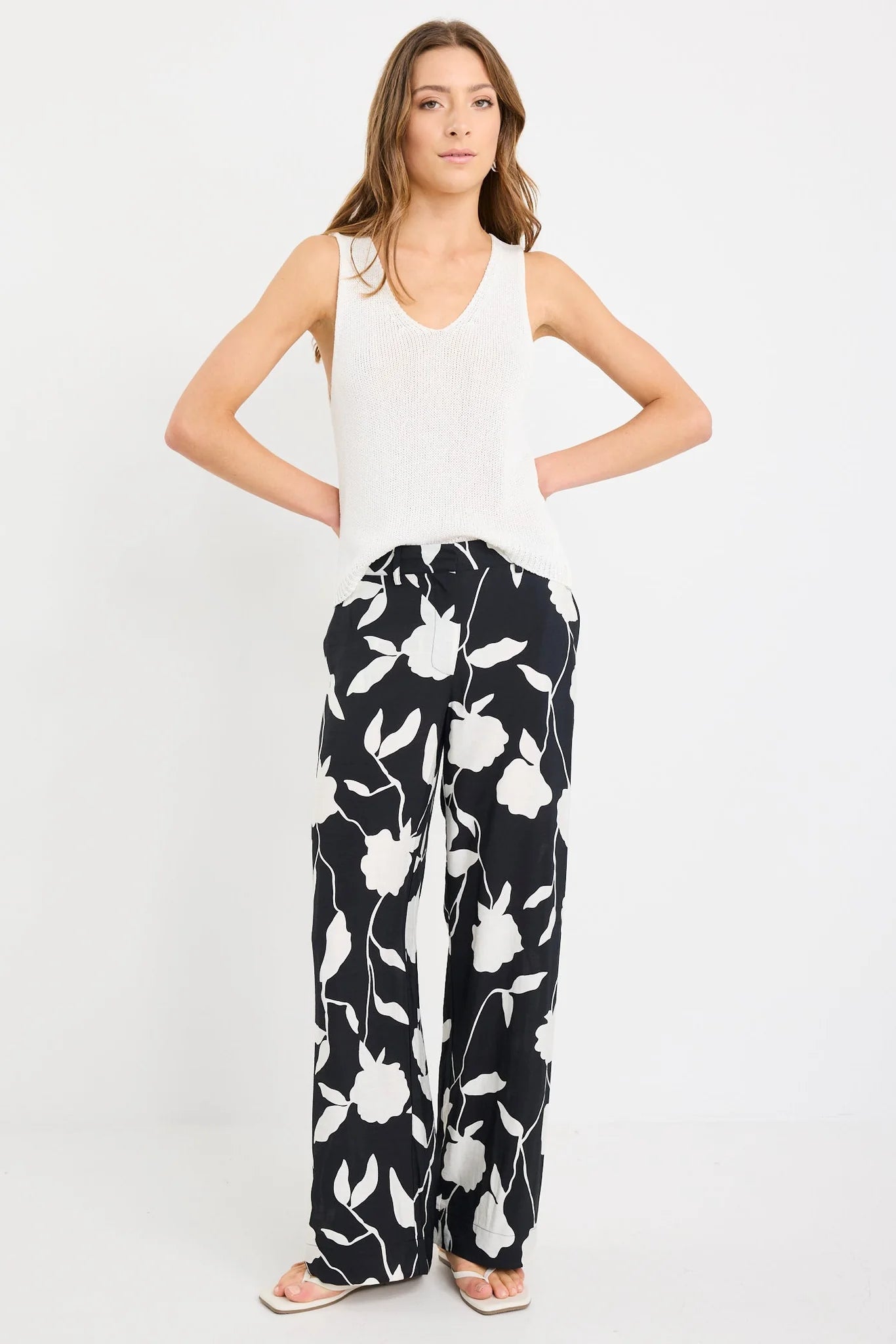 STORIES BE TOLD BENEFICIAL BLACK AND WHITE FLORAL FLAT FRONT ELASTIC BACK PANTS - THE VOGUE STORE