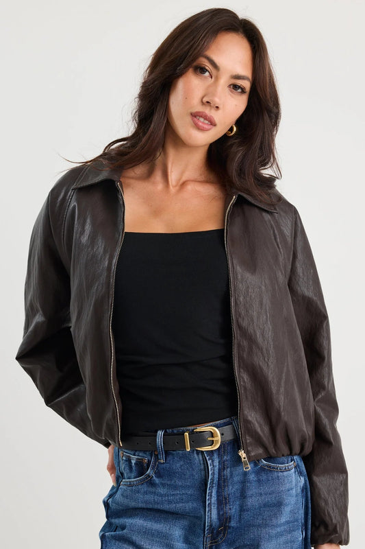 STORIES BE TOLD TROUPE CHOCOLATE PU LEATHER ZIP THROUGH BUBBLE HEM JACKET - THE VOGUE STORE
